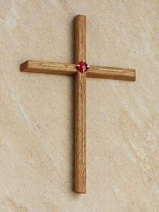 Wandkreuz mit dem Titel Quelle der Ruhe